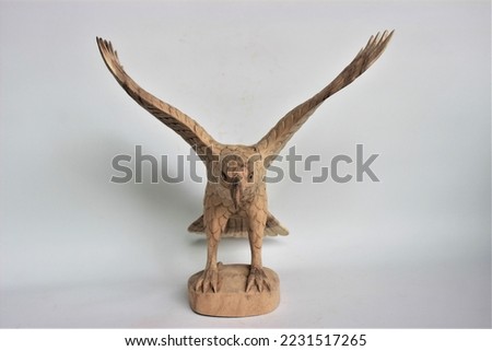 	
Balinese Handmade Eagle Wooden Sculpture Wood Carving, Sculpture, Art from Bali Indonesia Royalty-Free Stock Photo #2231517265