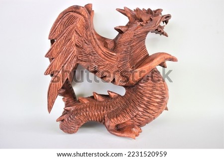 	
Wooden Dragon Sculpture Wood Carving, Sculpture, Art from Bali Indonesia Royalty-Free Stock Photo #2231520959