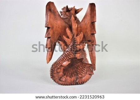	
Wooden Dragon Sculpture Wood Carving, Sculpture, Art from Bali Indonesia Royalty-Free Stock Photo #2231520963