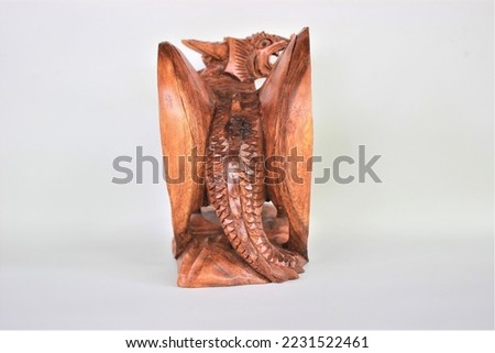 	
Wooden Dragon Sculpture Handmade Bali Wood Carving, Sculpture, Art from Bali Indonesia Royalty-Free Stock Photo #2231522461