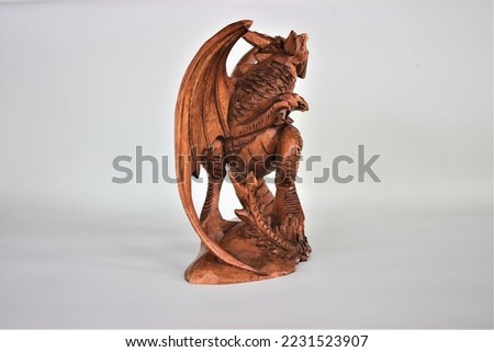 	
Wooden Dragon Sculpture Handmade Bali Wood Carving, Sculpture, Art from Bali Indonesia Royalty-Free Stock Photo #2231523907