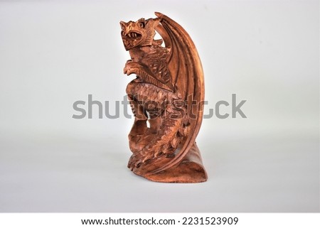 	
Wooden Dragon Sculpture Handmade Bali Wood Carving, Sculpture, Art from Bali Indonesia Royalty-Free Stock Photo #2231523909