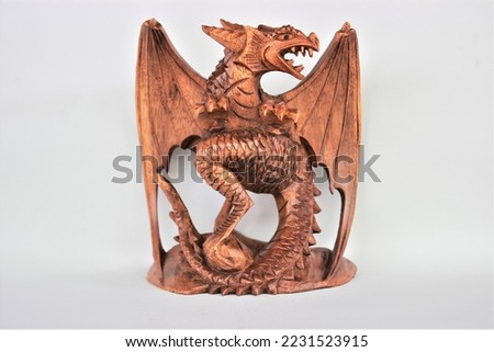 	
Wooden Dragon Sculpture Handmade Bali Wood Carving, Sculpture, Art from Bali Indonesia Royalty-Free Stock Photo #2231523915