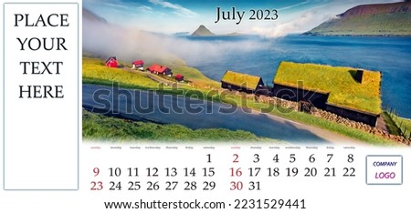July 2023. Desktop monthly calendar template with place logo and contact information. Set of calendars with amazing landscapes. Nice summer view of Velbastadur village, Faroe islands, Denmark, Europe.