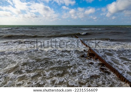 Sea landscape. Surfline with waves and foam at storm time. Nature background