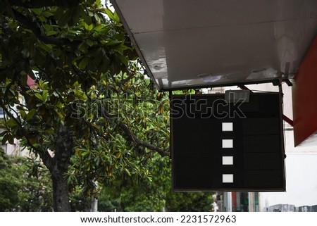Board with foreign currency exchange rates outdoors