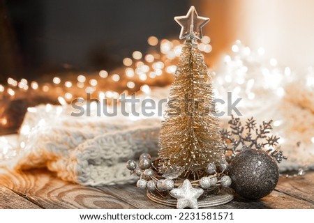 Christmas background with decorative fir tree on blurred background with bokeh.