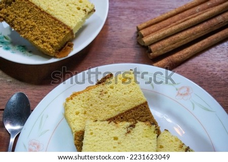 Stock photo of soft and sweet cake and some drinks