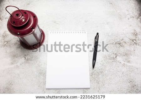 Notebook for drawing on the table, with a flashlight and a pencil. Royalty-Free Stock Photo #2231625179