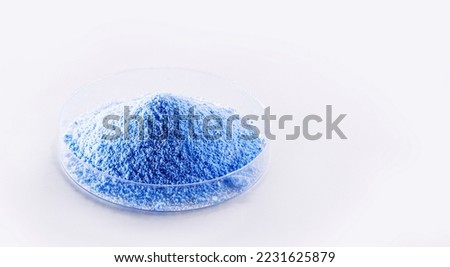 blue Fluorescent pigments, made up of a polymeric matrix, resins of different types such as polyester, alkyd, formaldehyde which are fused with organic dyes. Royalty-Free Stock Photo #2231625879
