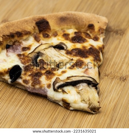 
piece of pizza with vegetable and white background