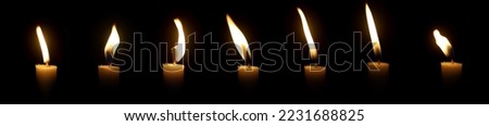 Set The candle flame glows in the dark dark night as background decoration in religious ceremonies and birthday celebrations. Many people have a happy big romantic holiday.