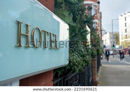 Hotel sign on city street