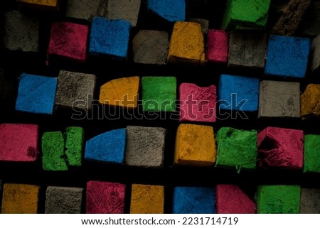 Abstract wallpaper. Stack of colorful wooden blocks