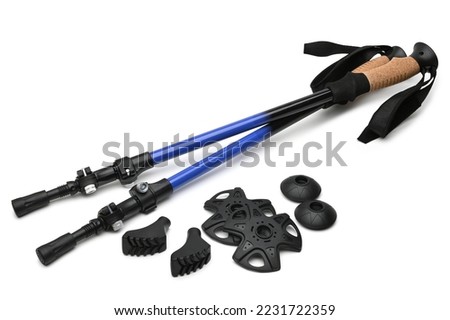Telescopic trekking poles with baskets and tips accessories on white background
 Royalty-Free Stock Photo #2231722359