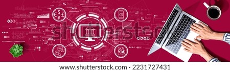 Fintech theme with person using a laptop computer