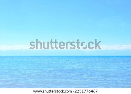 Beautiful sunny seascape. Blue sky. The sea is blue with waves. Skyline with clouds. Concept tourism, travel by water.
