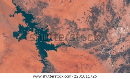 Lake Nasser in southern Egypt. Aerial view of lake. Earth landscape from satellite view. Earth texture from air. Elements of this image furnished by NASA Royalty-Free Stock Photo #2231811725