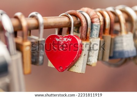 Love locks hanging on the bridge. Padlocks a concept of love, relationships, and affection.