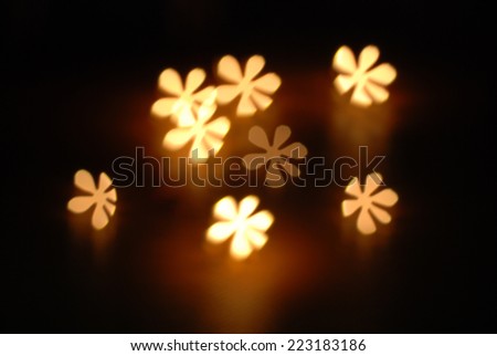 candle lights filtered flower background.
