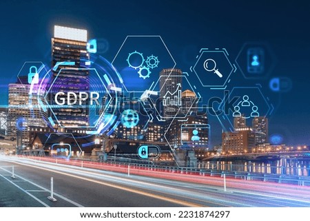 City view panorama of Boston Harbour and Seaport Blvd at night time, Massachusetts. Building exteriors of financial downtown. GDPR hologram is data protection regulation, privacy for all individuals