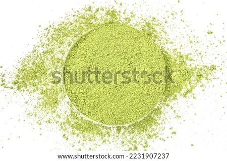 powdered matcha green tea, isolated on white. copy space. top view. Heap of matcha green tea powder on white background, view from above.