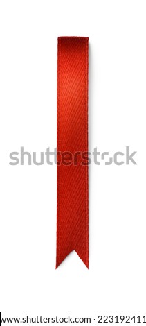 Red ribbon bookmark isolated on white background  Royalty-Free Stock Photo #223192411