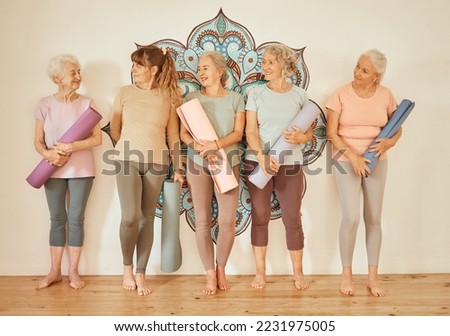 Yoga class, fitness and senior women training, happy with gym pilates and meditation as a group. Wall, calm and elderly friends at studio for mindfulness, spiritual workout and relax with exercise Royalty-Free Stock Photo #2231975005