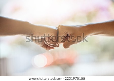 Teamwork, fist bump and motivation, collaboration and success for goals, trust and support. Closeup friends, greeting hands and team building, commitment and winner, solidarity and fighting racism Royalty-Free Stock Photo #2231975155