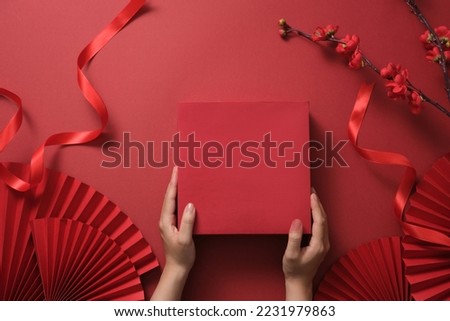 Preparing the gift for guests. Lunar new year culture. Chinese traditional holiday.   Royalty-Free Stock Photo #2231979863