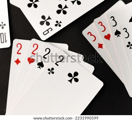 gambling card game. cards tens nines black and red diamonds worms clubs and spades on a dark background. for banners labels booklet splash screens