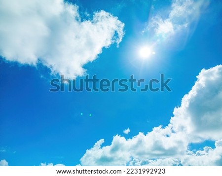 Background cloud summer. Cloud summer. Sky cloud clear. Natural sky beautiful blue and white texture background with sun rays shine. Scenic orange sunset sky background. digital lens flare