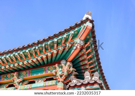Korean traditional eaves. The eaves of traditional temples. Beautiful Korean traditional eaves. Royalty-Free Stock Photo #2232035317
