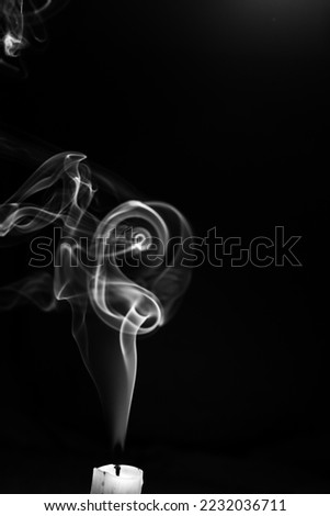candle smoke on a dark background