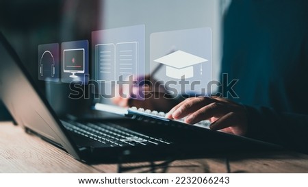 Concept of Online education. man use Online education training and e-learning webinar on internet for personal development and professional qualifications. Digital courses to develop new skills. Royalty-Free Stock Photo #2232066243