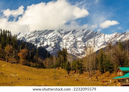 Manali in Himachal Pradesh. Panoramic views of Himalayas. Natural beauty of Solang Valley in India. Famous tourist place for travel, honeymoon destination in India set on Beas river. Rohtang Pass Snow