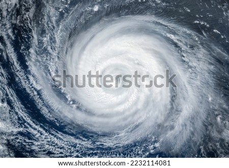 Super Typhoon, tropical storm, cyclone, hurricane, tornado, over ocean. Weather background. Typhoon,  storm, windstorm, superstorm, gale moves to the ground.  Elements of this image furnished by NASA. Royalty-Free Stock Photo #2232114081