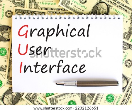 GUI graphical user interface symbol. Concept words GUI graphical user interface on white note on a beautiful background from dollar bills. Business and GUI graphical user interface concept. Copy space
