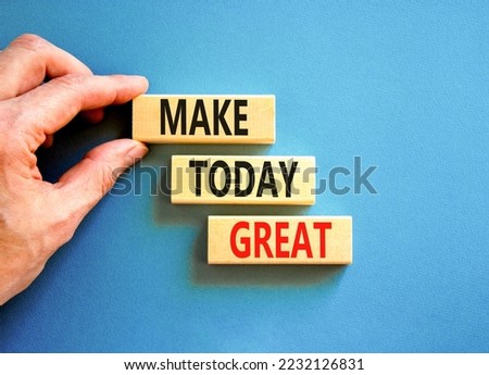 Motivation and Make today great symbol. Concept words Make today great on wooden blocks on a beautiful blue table blue background. Businessman hand. Business and make today great concept. Copy space.
