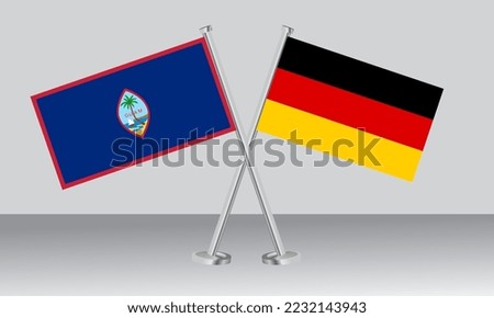 Crossed flags of Guam and Germany. Official colors. Correct proportion. Banner design