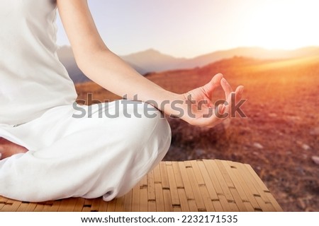 Young happy woman do yoga on outdoor