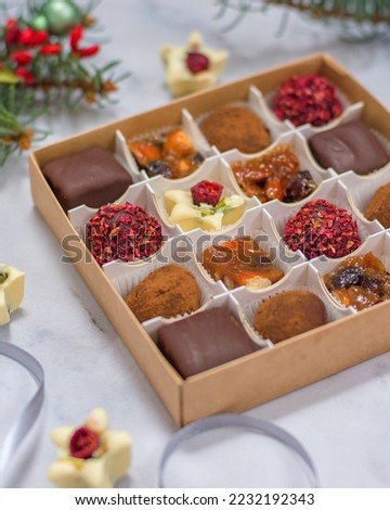 Assorted candies in a box. Christmas atmosphere