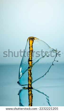 Water drop falling and colliding with another one