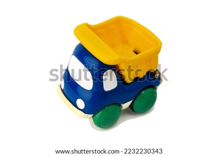  Toy children's dump truck isolated on a white background