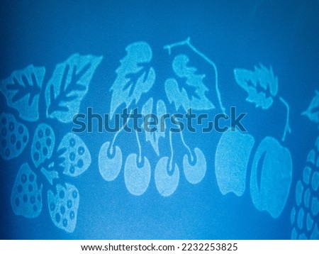 Light fruits on PVC background