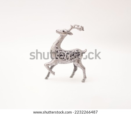 Decorative deer on a white background.