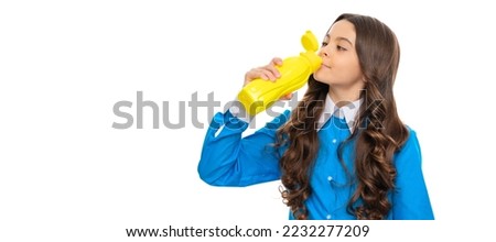 Taste and health put together. Little child drink from bottle. Yogurt drink. Horizontal poster of isolated child face, banner header, copy space. Royalty-Free Stock Photo #2232277209