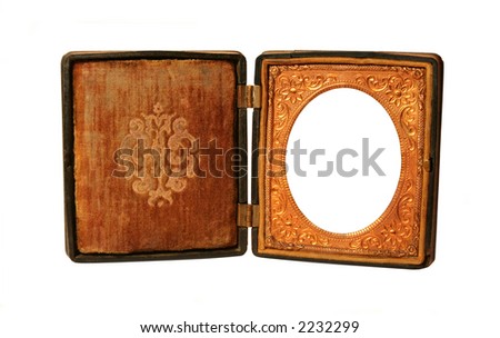 A hinged Daguerreotype frame from the 19th century.  Isolated on white.