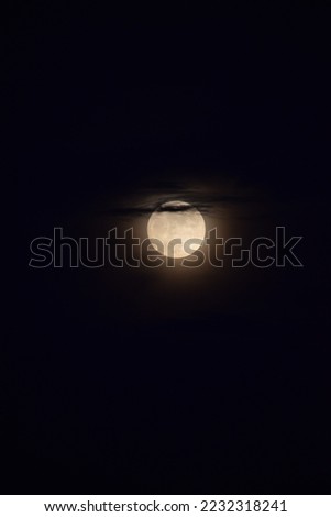 selective focus picture of moon with clouds