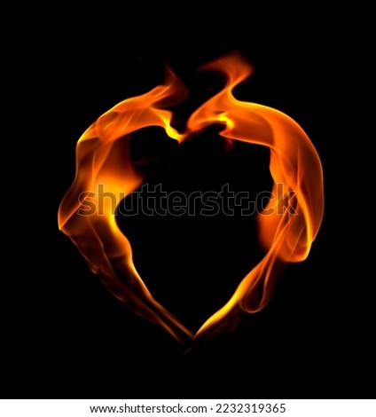 Fire heart isolated on black background. Royalty-Free Stock Photo #2232319365